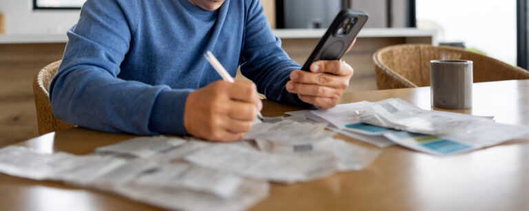 Middle aged man looking hopeful as he rebuilds his credit during and after a debt relief